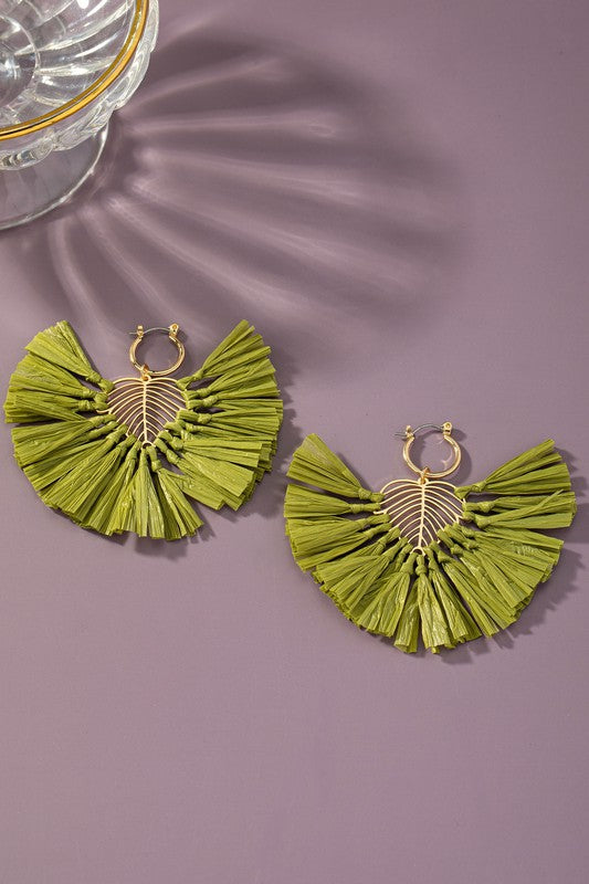 Statement earrings with raffia straw leaf drop